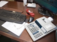 Keyboard and calculator on a desk